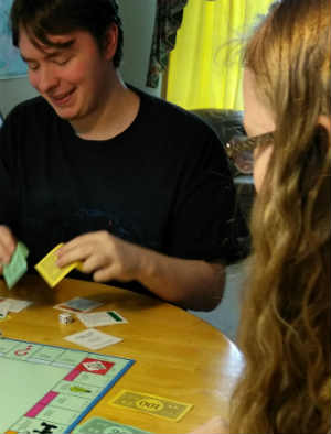 Kids playing monopoly