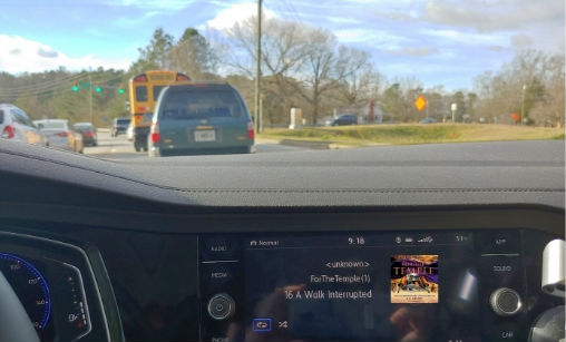 Peering through the windshield while listening